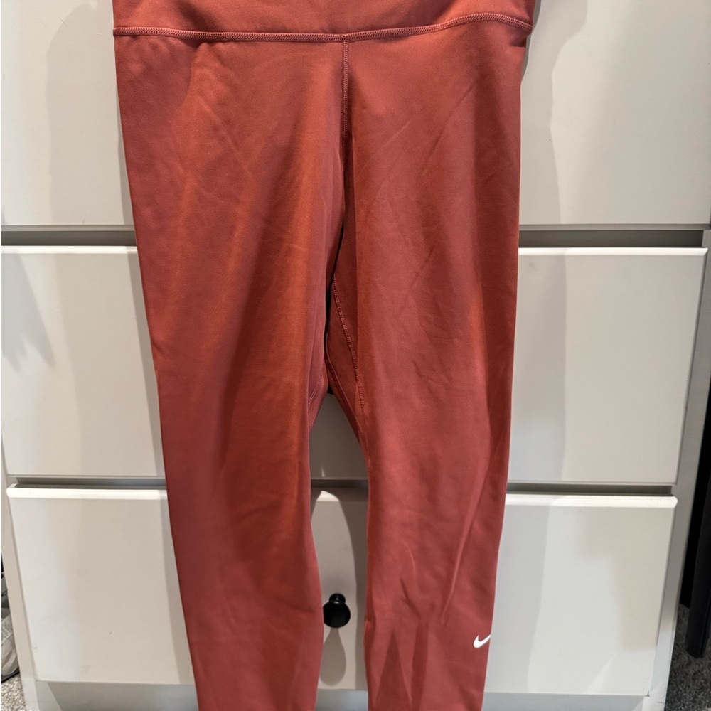 Women’s Nike Orange Leggings for Active Performance